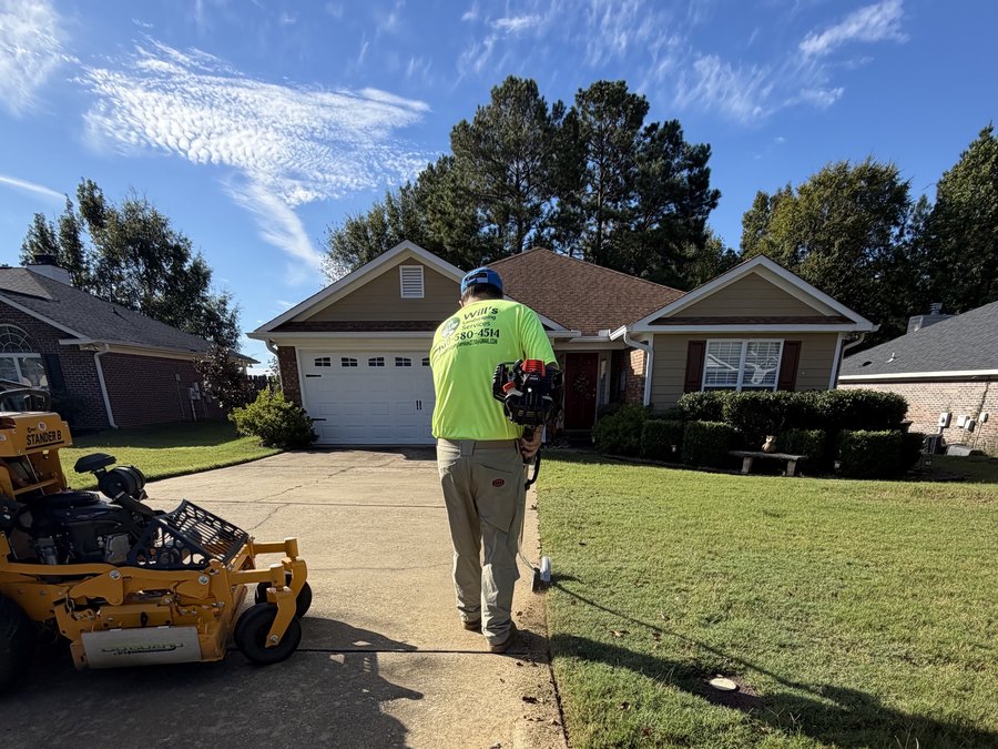Will trimming the driveway edge with the mower parked on the lawn